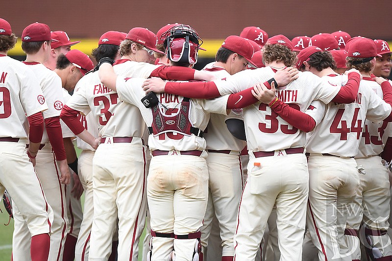 Arkansas Razorbacks huddle together following a 12-3 loss to Eastern Illinois University on Feb. 26, 2023. The Razorbacks dropped a 7-6 decision to Vanderbilt on Saturday, costing Arkansas an outright SEC regular-season title. (Photo by J.T. Wampler/Northwest Arkansas Democrat-Gazette)