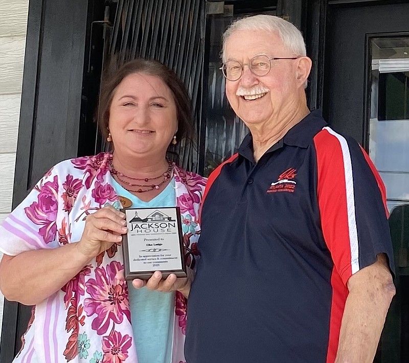 Tammy Jones, left, resource development and volunteer administrator of Jackson House, is shown with Herb Carey, Arkansas State Elks Association 1st vice president and Lodge 380 grant writer. - Submitted photo