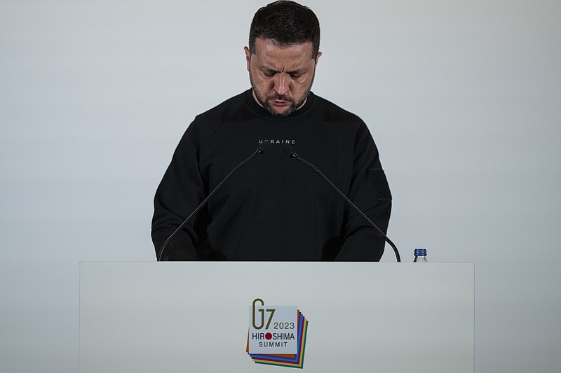 Ukrainian President Volodymyr Zelenskyy speaks during a news conference at the Group of Seven nations' summit in Hiroshima, western Japan, Sunday, May 21, 2023. (AP Photo/Louise Delmotte, Pool)