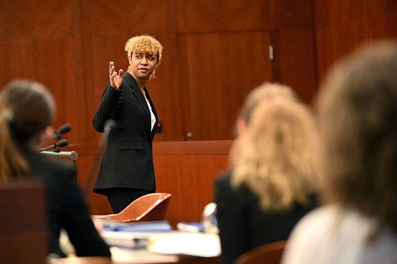 Kine Yade, a Seattle Preparatory School student, gives her opening statement during the 2023 National High School Mock Trial Championship hosted by the Arkansas Mock Trial Foundation on Saturday at the federal courthouse in downtown Little Rock.
(Arkansas Democrat-Gazette/Staci Vandagriff)