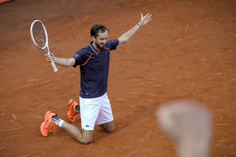 Daniil Medvedev of Russia celebrates defeating Denmark's Holger Rune during the men's final at the Italian Open Sunday in Rome, Italy. - Photo by Gregorio Borgia of The Associated Press