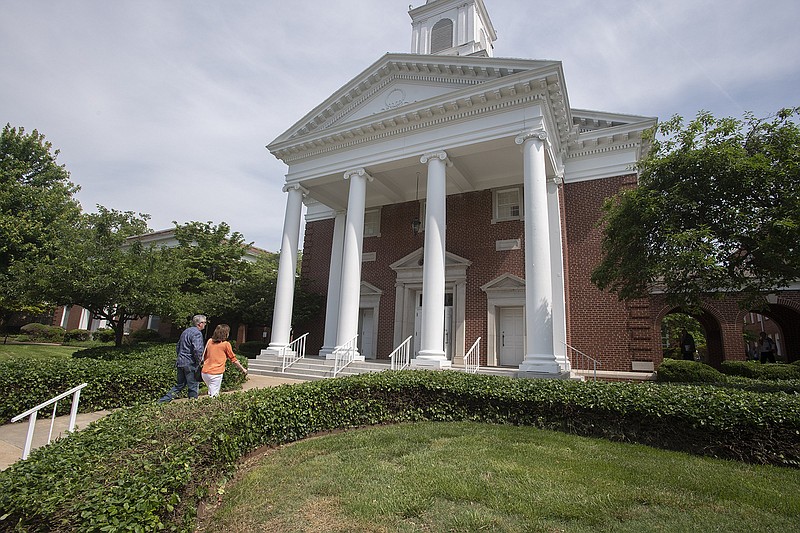 A couple enters church before services Sunday at Central United Methodist Church on Dickson Street on Fayetteville. Visit nwaonline.com/photo for today's photo gallery. 
(NWA Democrat-Gazette/J.T. Wampler)