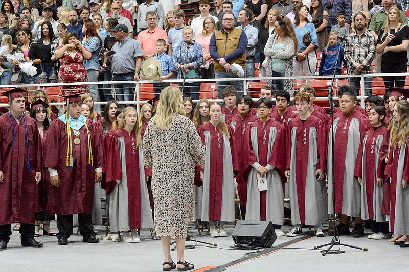 Graham Thomas/Herald-Leader
The Panther Singers perform the Siloam Springs High School alma mater at SSHS's 115th annual Commencement Exercises on Saturday, May 20, at Barnhill Arena in Fayetteville.