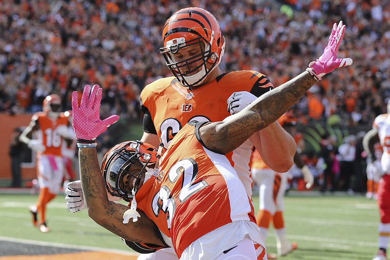 Cincinnati Bengals running back Jeremy Hill (32) reacts after scoring a touchdown in the second half of an NFL football game against the Kansas City Chiefs, Oct. 4, 2015, in Cincinnati. - Photo by Gary Landers of The Associated Press