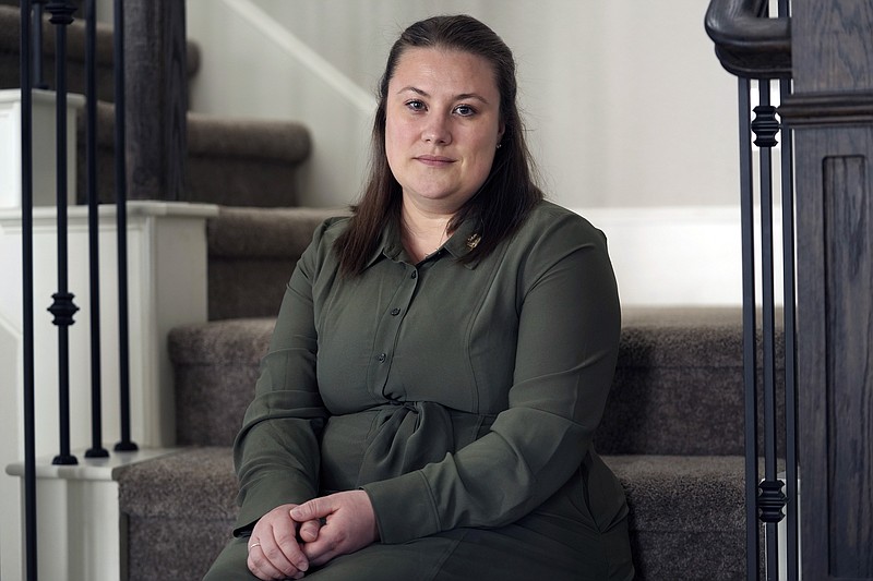 Jessica Bernardo poses for a photo at her home Thursday, May 18, 2023, in the Dallas area. More Texas women who were told they could not end pregnancies with fatal fetal anomalies or that endangered their health are challenging the state's restrictive abortion laws. (AP Photo/LM Otero)