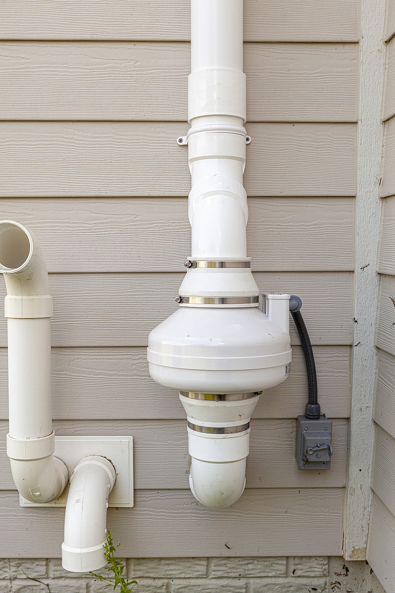 A radon mitigation system uses pipes and fans to redirect radon out of the home. (Dreamstime/TNS)