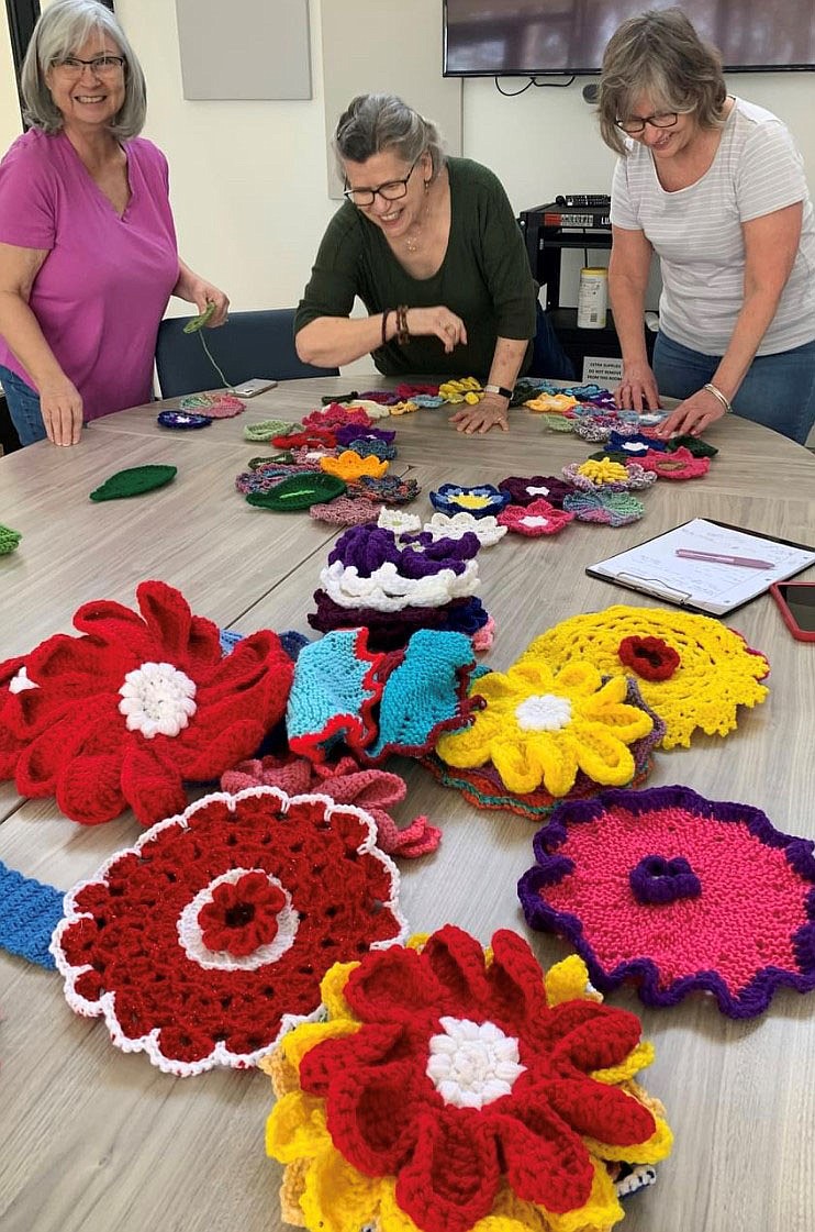 Sally Carroll/Special to The Weekly Vista Leading the effort for this year's Bella Vista in Bloom are (from left) Teresa Smothers Oller, Debra DeVilbiss and Chrissy Laine Hallwachs.