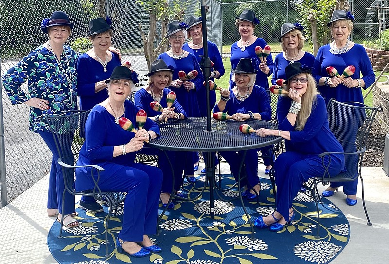 From left, members Peggy Holt, Kathy Nichols, Delois Cox, Terri Dill, Kathy Ward, Kaye Parks, Shelby Church, Shelley Bunger, Sandi Martin, Sherri Hardmam, and Coni Hall are shown recently at The Caring Place. - Submitted photo