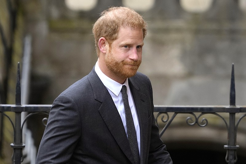 FILE - Britain's Prince Harry arrives at the Royal Courts Of Justice in London, Thursday, March 30, 2023. A lawyer has asked a London judge to allow Prince Harry to challenge the government's denial of his request to pay for police protection when he visits the U.K. Attorney Shaheed Fatima said Tuesday, May 16, 2023 that the government had exceeded its authority. (AP Photo/Kirsty Wigglesworth, File)