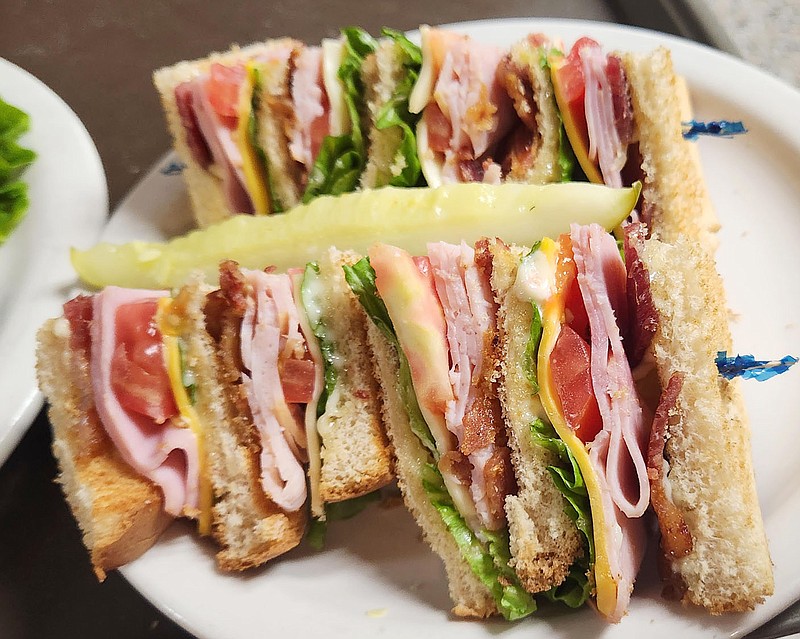 The Old South Restaurant in Russellville offers a mighty club with its 1950s showcase aura of perfectly quartered ham, turkey, bacon and cheese on white bread.

(Courtesy Photo/Kat Robinson)