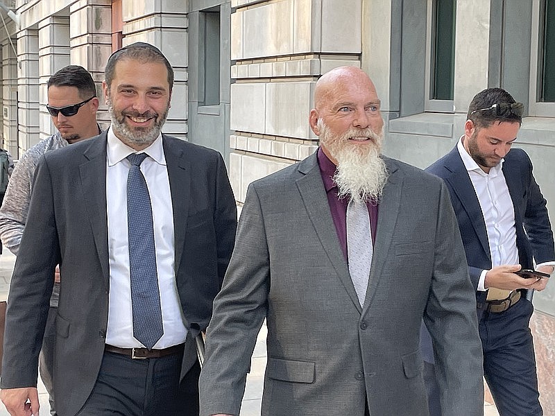 Richard Barnett, right, with his attorney, Jonathan Gross, after Barnett was sentenced to 54 months in prison on Wednesday, May 24, 2023. (Arkansas Democrat-Gazette/Bill Bowden).