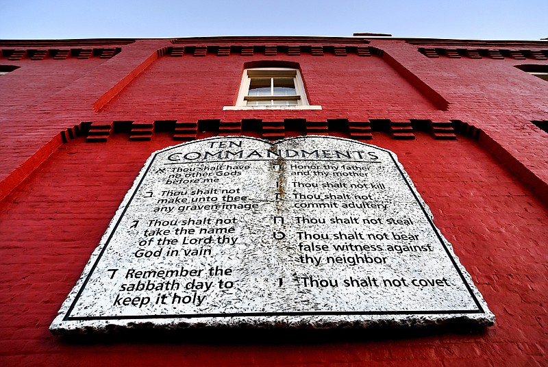 A copy of the Ten Commandments in stone hangs on a building next to the Pickens County Courthouse in October 2022, in Jasper, Ga. (Washington Post photo by Michael S. Williamson)