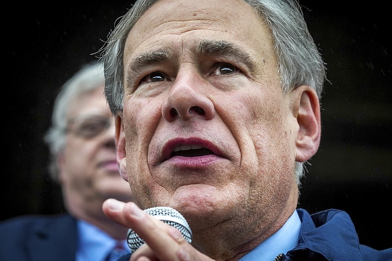 FILE - Gov. Greg Abbott speaks on the north steps of the State Capitol to supporters at a Texas Public Policy Foundation Parent Empowerment rally on March 21, 2023, in Austin. Texas would expand what can be defined as sexually explicit material or potentially harmful to children in order to ban books from public and charter school libraries, under a bill given final passage by the state Senate late Tuesday night, May 23 and sent to Republican Gov. Abbott. (Ricardo B. Brazziell/Austin American-Statesman via AP, File)