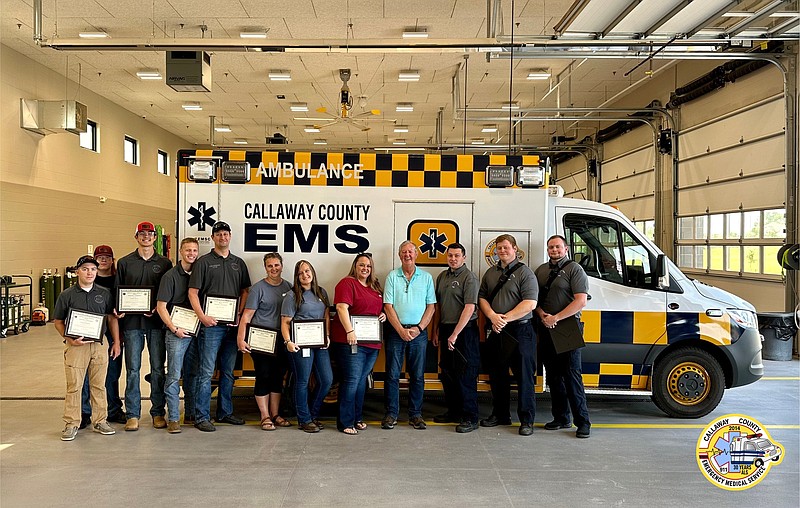 Photo courtesy Callaway County EMS
Ronald Frala poses for a photo with some of the first responders who saved his life after cardiac arrest. Callaway County Joint Communications, Holts Summit Fire Protection District, Holts Summit Police Department and Callaway County EMS were all involved in saving his life.