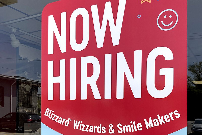 A hiring sign is displayed at a fast food restaurant in Northbrook, Ill., Monday, May 22, 2023. On Thursday, the Labor Department reports on the number of people who applied for unemployment benefits last week. (AP Photo/Nam Y. Huh)