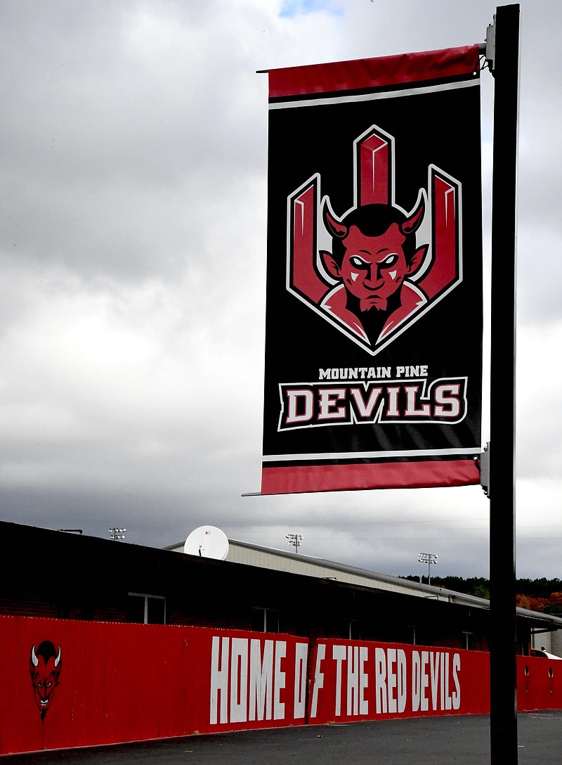 A banner is displayed at Mountain Pine High School. - File photo by The Sentinel-Record