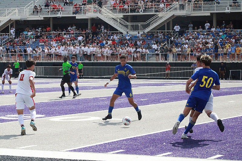 Lakeside's Caleb Rush (50) passes to Adrian Arreola (6) during the Class 5A state title game against Russellville May 19 in Conway. - Photo by Lance Porter of The Sentinel-Record
