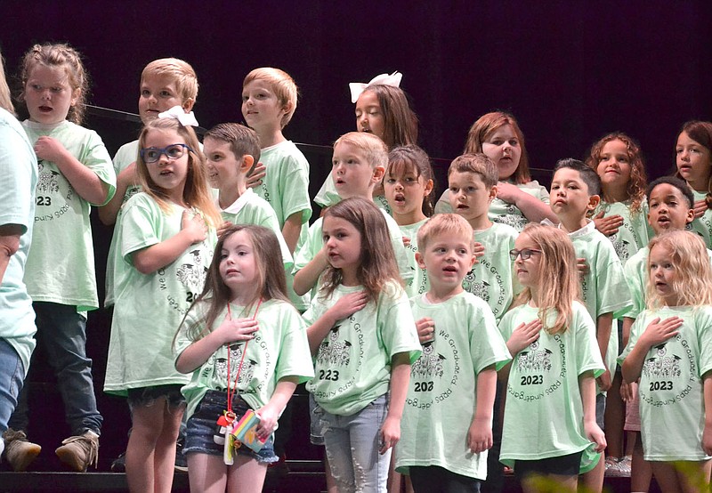 Annette Beard/Pea Ridge TIMES
For the kindergarten graduation ceremony, the students of Pea Ridge Primary School kindergarten classes sang and performed several songs under the direction of music teacher Lorna Taylor before receiving their diplomas.