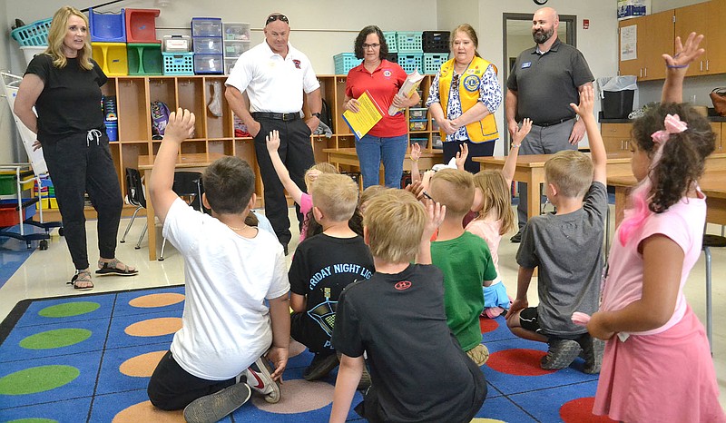 Annette Beard/Pea Ridge TIMES
Members of the Pea Ridge Lions Club visited the first-grade class of Mrs. Amber Bowen Friday, May 26, 2023, and delivered books about fire safety to the students.