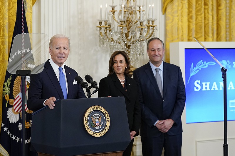 President Joe Biden speaks during a reception to celebrate the Jewish new year in the East Room of the White House on Sept. 30, 2022, in Washington. Vice President Kamala Harris and her husband, Doug Emhoff, look on at right. Biden on Thursday, May 25, 2023, announced what he said is the most ambitious and comprehensive undertaking by the U.S. government to fight hate, bias and violence against Jews, outlining more than 100 steps the administration and its partners can take to combat an alarming rise in antisemitism. (AP Photo/Susan Walsh, File)