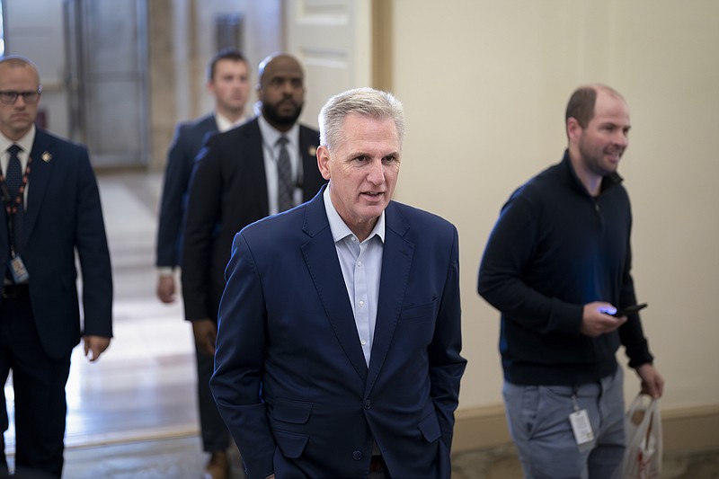 Speaker of the House Kevin McCarthy, R-Calif., talks to reporters about the debt limit negotiations as he arrives at the Capitol on Friday, May 26, 2023, in Washington. McCarthy said the mediators "made progress" on a deal with the White House to raise the debt limit and cut federal spending, as they race for agreement this weekend. (AP Photo/J. Scott Applewhite)