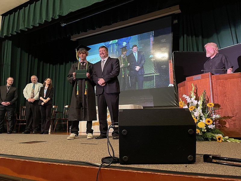 Andrea Merritt/Fulton Sun photo: 
Maxwell Samborski receives his diploma from Christopher Daily, Superintendent of the Missouri School for the Deaf, during the Class of 2023 graduation ceremony on May 26.