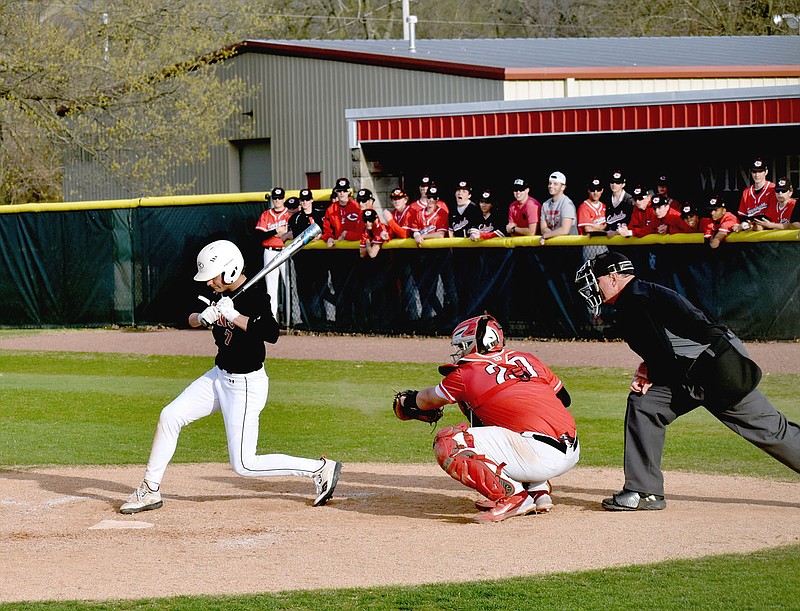 Mark Humphrey/Enterprise-Leader
Farmington senior Owen O'Bryan, shown snagging a curve ball in an April 7 win over Gravette (9-7), was voted "Outstanding Catcher" in the 4A-1. O'Bryan batted .290, finished second in on-base percentage at .446, and produced 18 hits, including 7 doubles and 15 RBIs.