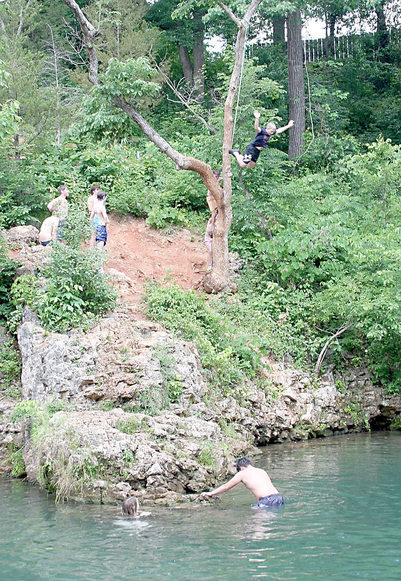 Lynn Atkins/Special to The Weekly Vista Even before school was officially let out for the summer, McKissic Creek drew a crowd of swimmers, jumpers and anglers as the temperature finally started to rise. On Friday, May 26, several groups of teens cooled off at the popular swimming hole located off of Wishing Springs Road.