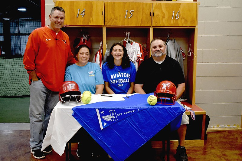 Mark Humphrey/Enterprise-Leader
Farmington 2023 graduate Skyler Riddle signed a national letter of intent to play women's college softball for Arkansas State University-Newport on Wednesday, May 24, at the Lady Cardinals' indoor facility. She was accompanied by her parents and Farmington coach Jason Shirey.
