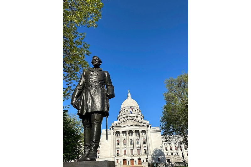 A statue of Han Christian Heg stands outside the Wisconsin state Capitol in Madison, Wis., on May 11, 2023. A man who helped topple the statue of the Civil War hero and abolitionist has been sentenced to six months in jail for the damage he caused and for looting a nearby jewelry store. (AP Photo/Scott Bauer)