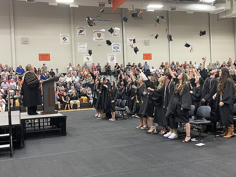 Andrea Merritt/Fulton Sun photo: 
The New Bloomfield High School Class of 2023 throws their graduation caps in the air, during their graduation ceremony at New Bloomfield gym on May 27.