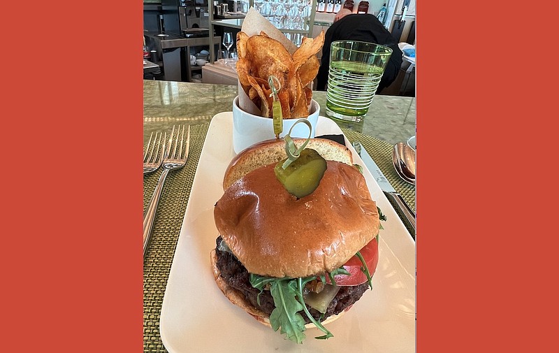 The Park Grill Burger, one of the "brag" items on chef Patrick Herron's menu at Park Grill, comes with Bloody Mary kettle chips.
(Arkansas Democrat-Gazette/Eric E. Harrison)