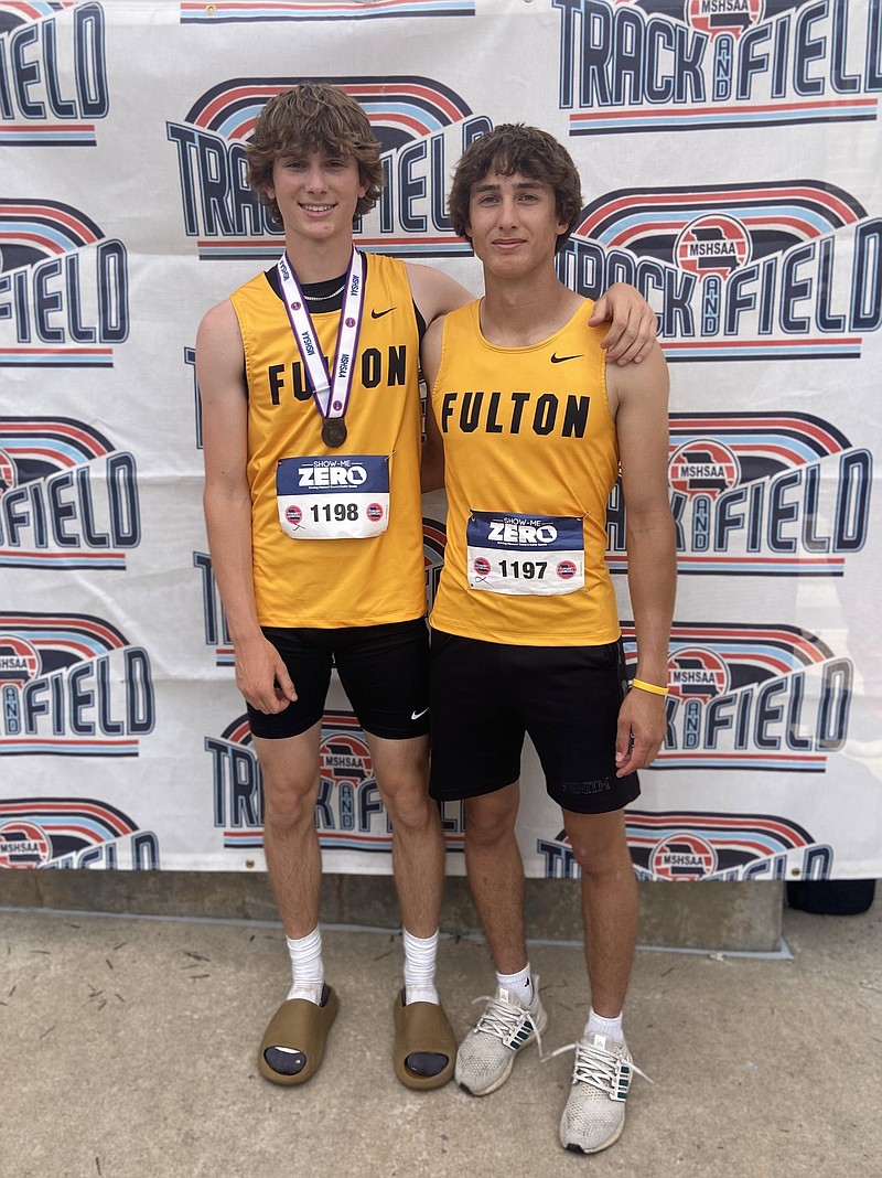 Fulton's Ethan Milius (left) and Gabe DeFily (right) post for a photo after competing in the triple jump in the Class 4 state championships Saturday at Adkins Stadium in Jefferson City. Milius made all-state with his fifth-place finish, while DeFily finished one spot below all-state. (Courtesy/FHS Hornet Track & Field)