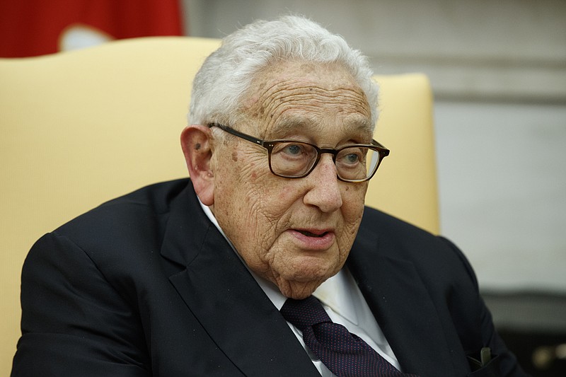 FILE - Former Secretary of State Henry Kissinger speaks during a meeting with President Donald Trump in the Oval Office of the White House, Tuesday, Oct. 10, 2017, in Washington. Kissinger marks his 100th birthday on Saturday, May 27, 2023, outlasting many of his political contemporaries who guided the United States through one of its most tumultuous periods including the presidency of Richard Nixon and the Vietnam War. (AP Photo/Evan Vucci, File)
