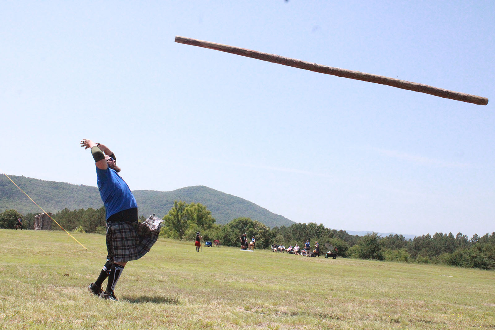 WATCH | Athletes throw tree trunks, enjoy atmosphere at Highland Games - Vimarsana News