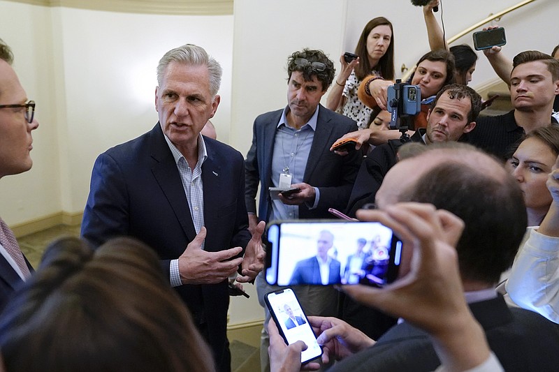 House Speaker Kevin McCarthy of Calif., speaks with members of the press about debt limit negotiations Saturday, May 27, 2023, on Capitol Hill in Washington. (AP Photo/Patrick Semansky)