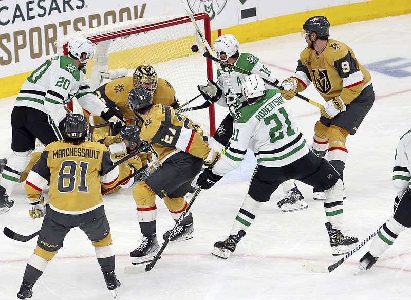 Dallas Stars left wing Jason Robertson (21) scores in the second period during Game 5 against the Vegas Golden Knights Saturday in Las Vegas. - Photo by Ronda Churchill of The Associated press