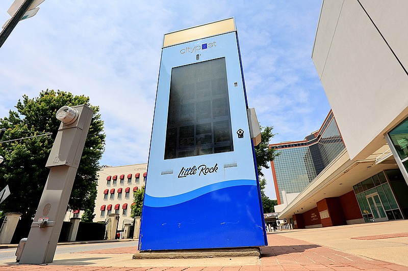 A kiosk flashes messages Wednesday May 24, 2023, outside the Statehouse Convention Center in Little Rock. (Arkansas Democrat-Gazette/Staton Breidenthal).