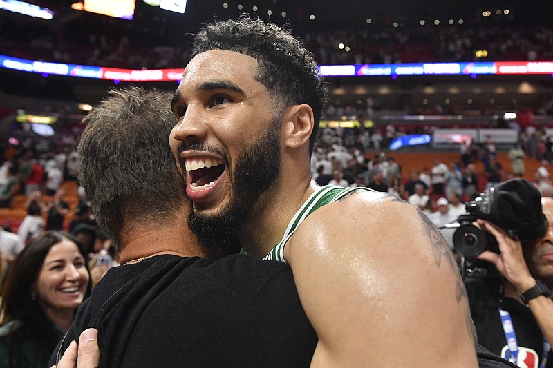 Boston Celtics forward Jayson Tatum celebrates after the Celtics beat the Miami Heat 104-103 during Game 6 Saturday in Miami. - Photo by Michael Laughlin of The Associated Press