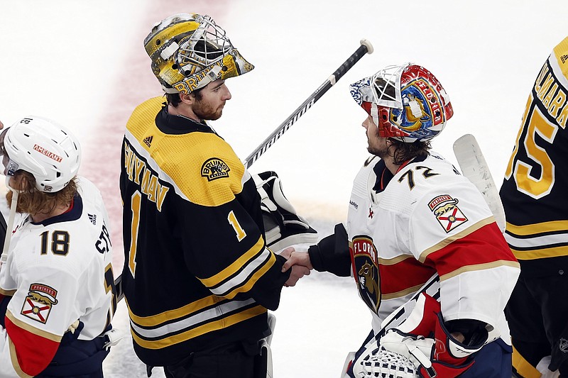 Boston Bruins' Jeremy Swayman (1) shakes hands with Florida Panthers' Sergei Bobrovsky (72) after losing to the Panthers in overtime during Game 7 of an NHL hockey Stanley Cup first-round playoff series, Sunday, April 30, 2023, in Boston. (AP Photo/Michael Dwyer)