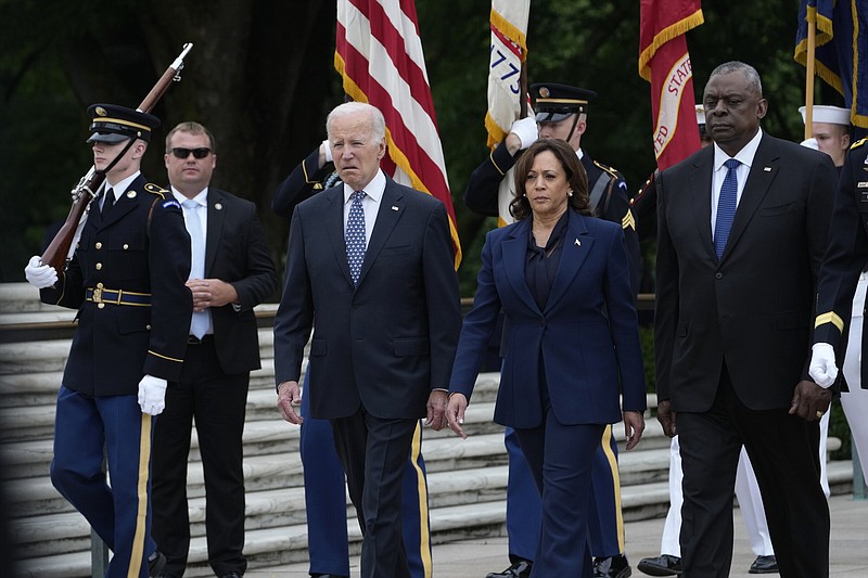 President Joe Biden, Vice President Kamala Harris and Defense Secretary Lloyd Austin arrive at The Tomb of the Unknown Soldier at Arlington National Cemetery in Arlington, Va., on Memorial Day, Monday, May 29, 2023. (AP Photo/Susan Walsh)