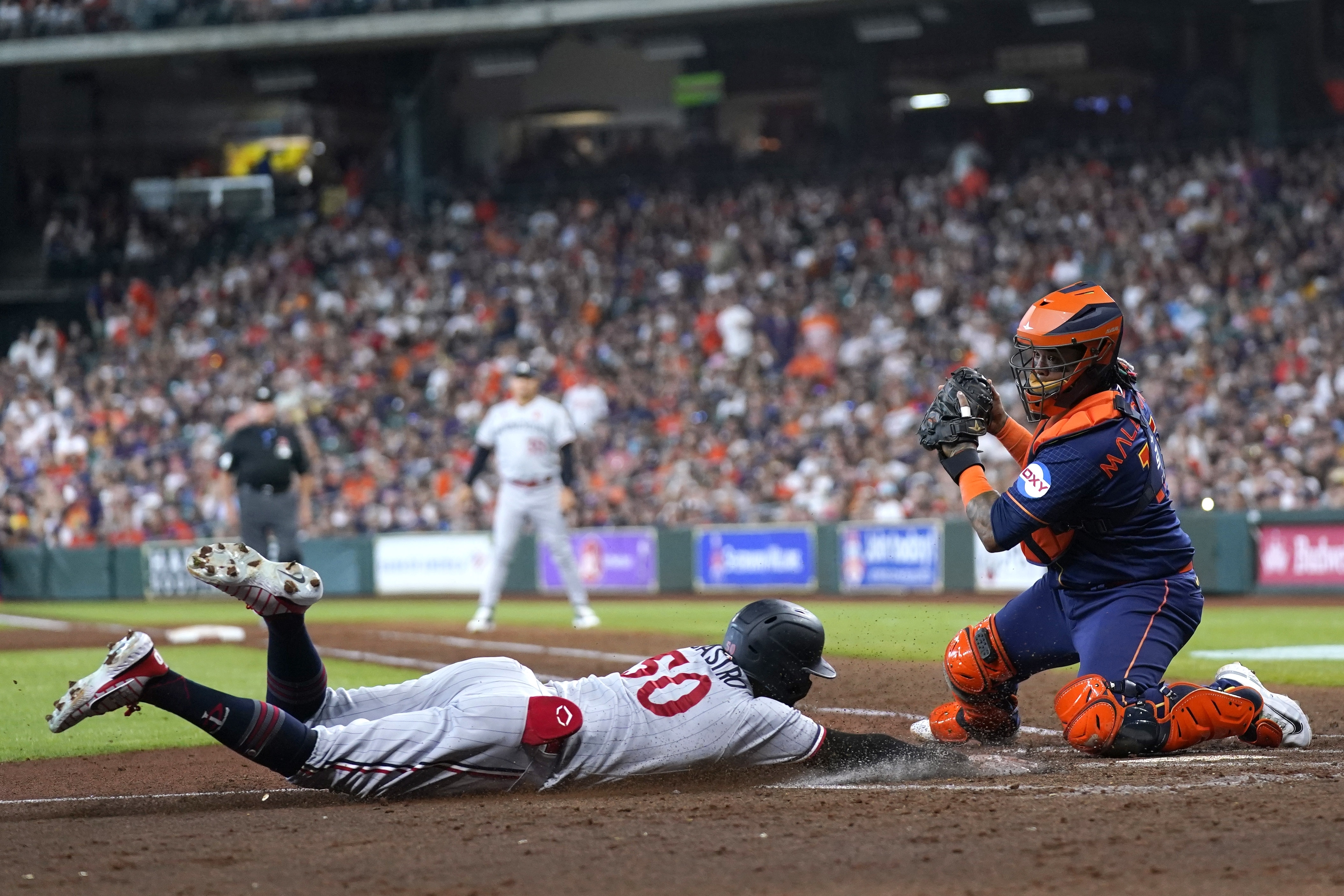 Houston Astros' Jose Altuve runs the bases after hitting a grand slam  against the Minnesota Twins during the seventh inning of a baseball game  Monday, May 29, 2023, in Houston. (AP Photo/David