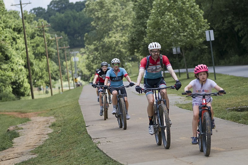 Bikers ride, Thursday, June 1, 2023 along the Razorback Greenway in Bentonville. Visit nwaonline.com/photos for today's photo gallery.

(NWA Democrat-Gazette/Charlie Kaijo)