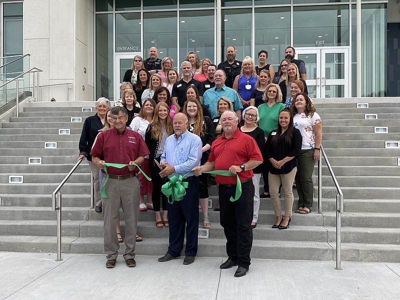 Anakin Bush/Fulton Sun
Gary Jungermann — surrounded by city and county officials — cuts the ribbon at the Callaway County Justice Center. Construction on the Justice Center began in July 2021.