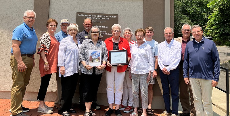 The Garland County Historical Society Board of Directors recently celebrated the award for Best County or Local Journal given to The Record 2022 by the Arkansas Historical Association. From left are Ray Rosset, treasurer, Carol Moenster Dyer, Clyde Covington, Toma Noble Whitlock, Ron Fuller, Bitty Martin, president, Liz Robbins, executive director, Julie Brenner Nix, Elaine Johnston, secretary, Kyle Clem, Tom French, John Hoefl, and Len Pitcock, vice president. Not pictured is Minnie Lenox. - Submitted photo