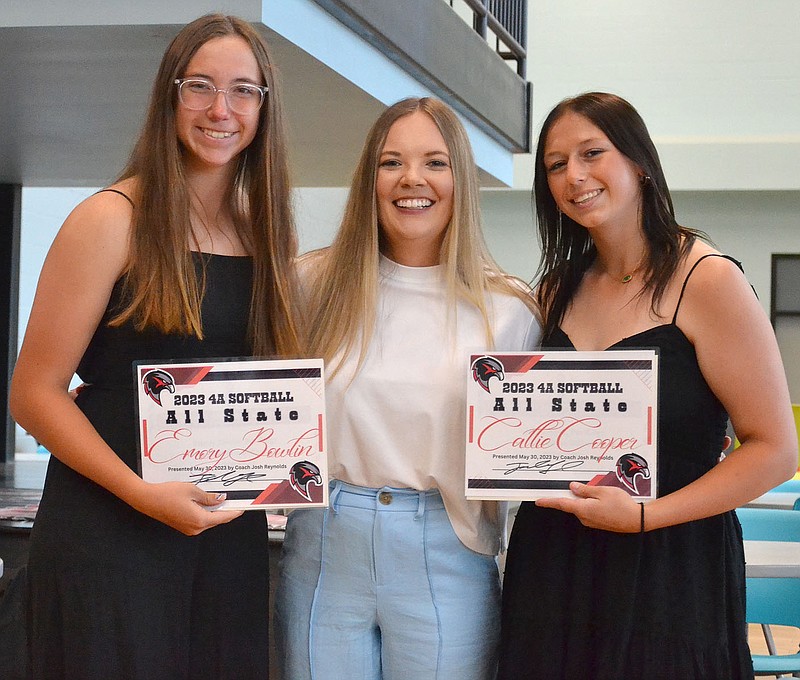 Annette Beard/Pea Ridge TIMES
Lady Blackhawks Emory Bowlin and Callie Cooper were given certificates by assistant coach Elzie Fields for being named All State. For more photographs, go to the PRT gallery at https://tnebc.nwaonline.com/photos/.