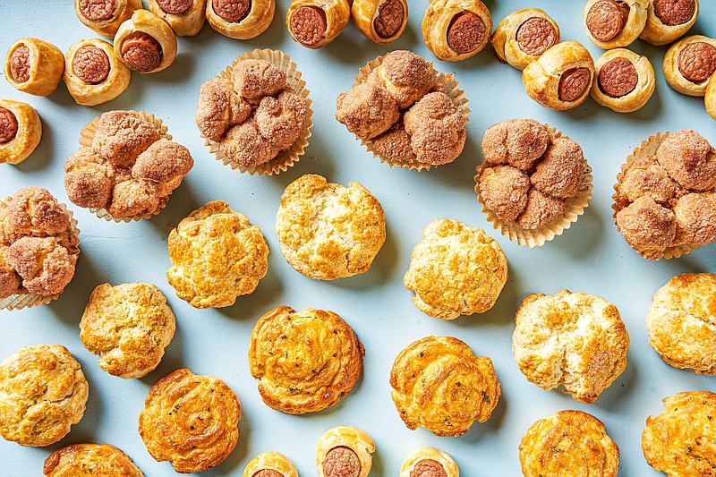 These Pigs in a Blanket, Cinnamon Pull-Apart Muffins, Drop Biscuits and Cheesy Chive and Pepper Pinwheels were all made using the same, one-bowl Cream Biscuit Dough. (For The Washington Post/Rey Lopez)