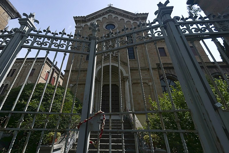 A view of a former monastery, in Rome, Monday, May 29, 2023, situated on a quiet residential street. It once sheltered Jews fleeing deportation in World War II. Purchased by the Vatican in 2021 as a dormitory for foreign nuns studying at Romes pontifical universities, the building now stands empty, a collateral victim of the latest financial scandal to hit the Holy See. (AP Photo/Alessandra Tarantino)