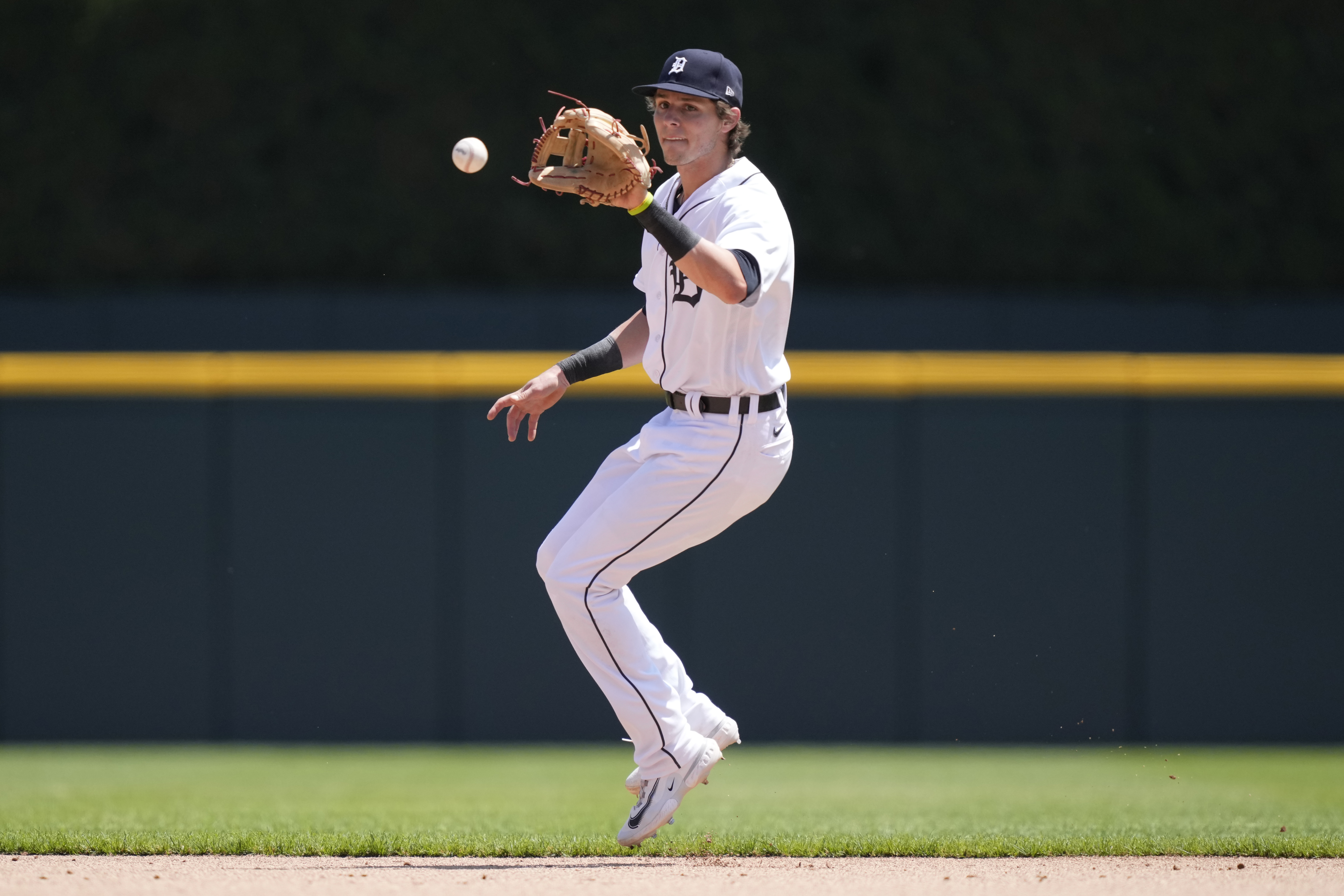 Rogers, Marisnick lead Tigers over Rangers 3-2