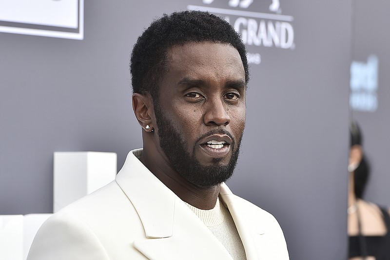 FILE - Music mogul and entrepreneur Sean "Diddy" Combs arrives at the Billboard Music Awards in Las Vegas on May 15, 2022. Combs is suing Diageo, saying the spirits company didn't make promised investments in his vodka and tequila brands and treated them as inferior "urban" brands. (Photo by Jordan Strauss/Invision/AP, File)